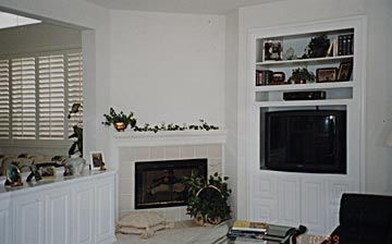 entertainment center, fireplace