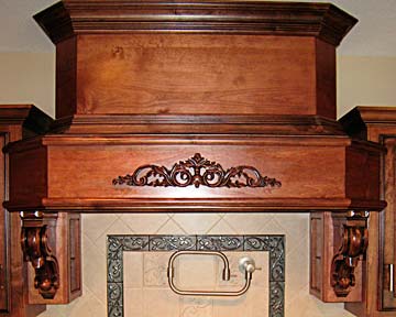 Carved kitchen range hood