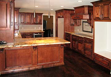 carved corbels, kitchen island